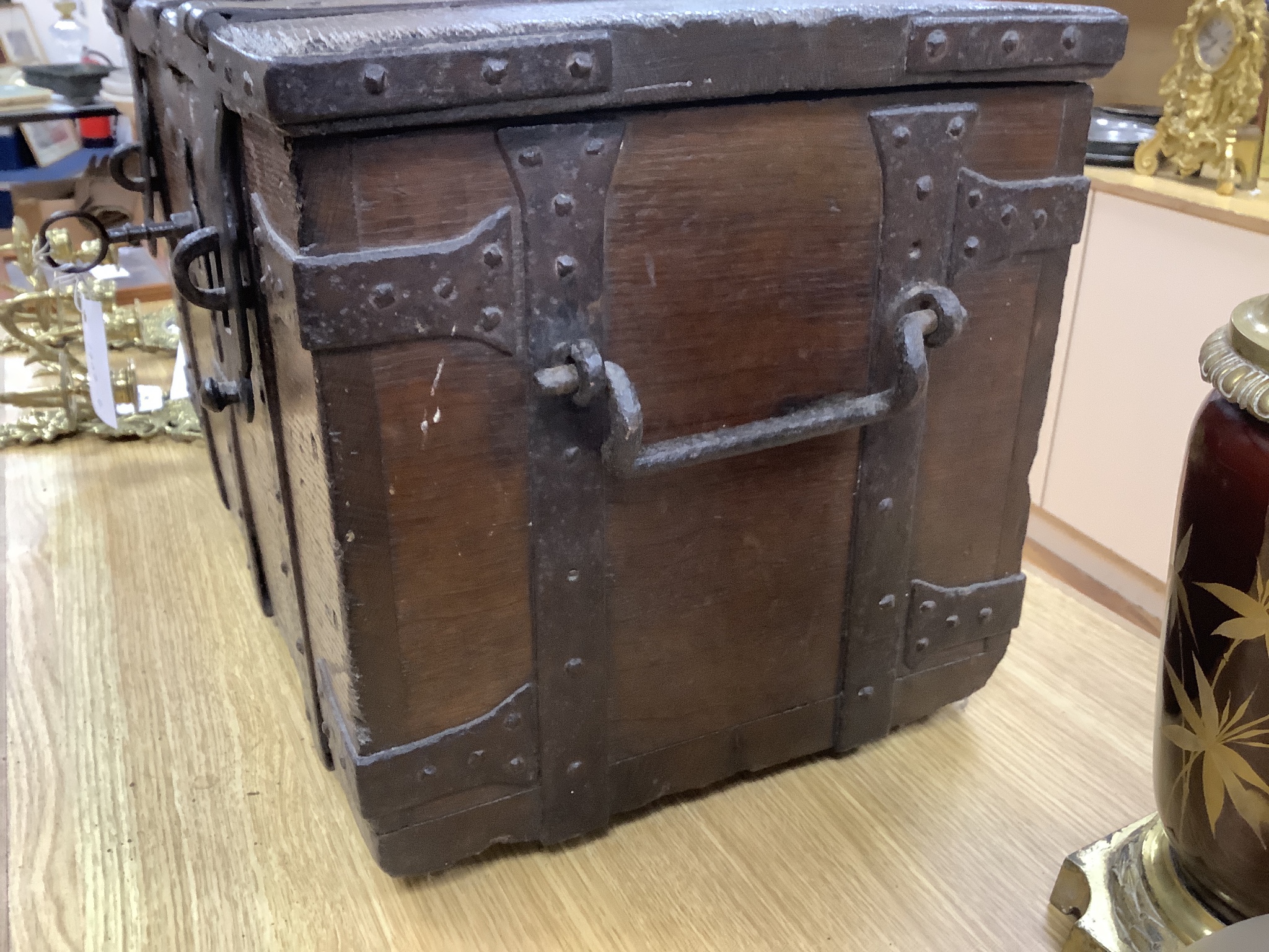 A 17th/18th century iron bound oak strong box, 60cm wide, 36cm deep, 35.5cm high